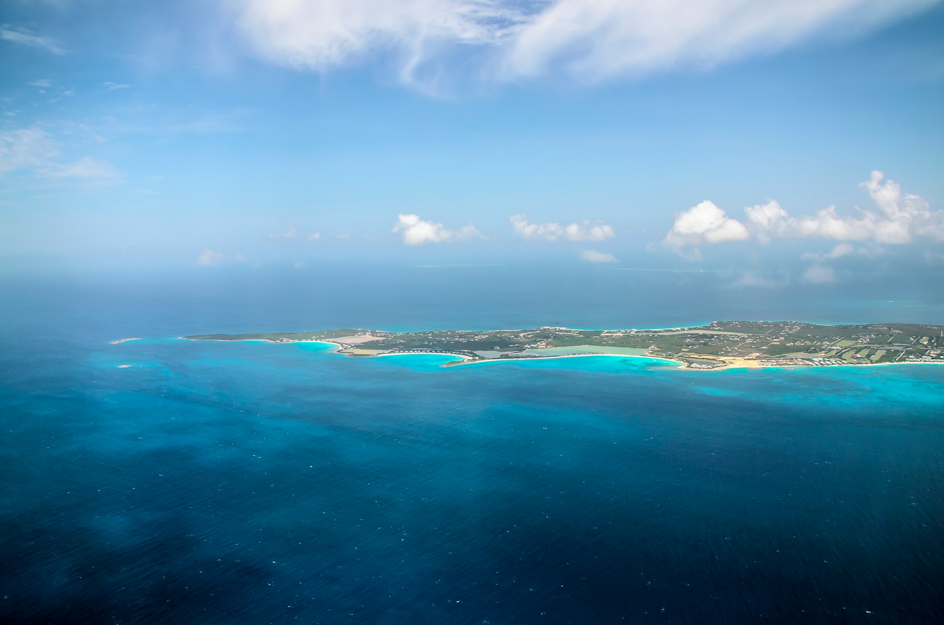 Aerial view of St Maarten coastline and turquoise waters